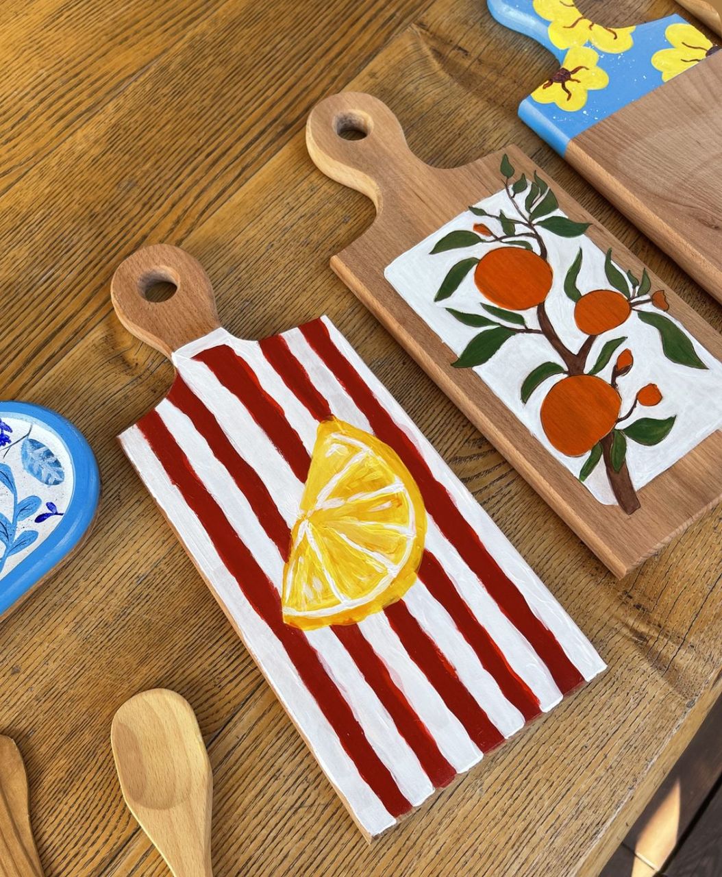 Painted wooden dessert serving platter from a Sip and Paint .NG session