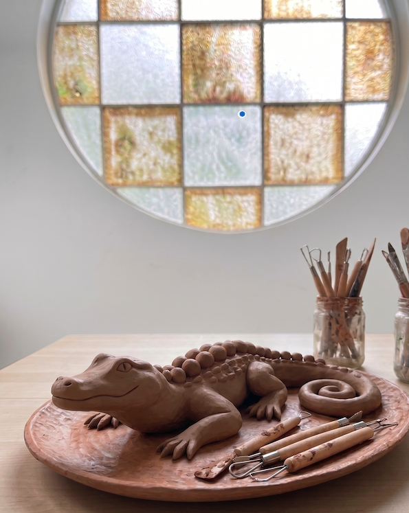 sculpt a reptile at Alali pottery Session